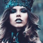 Girl in a crown with dark makeup and dark lipstick