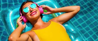 girl in headphones in the pool